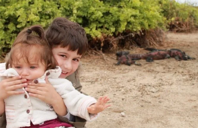 two kids on the Galapos Islands