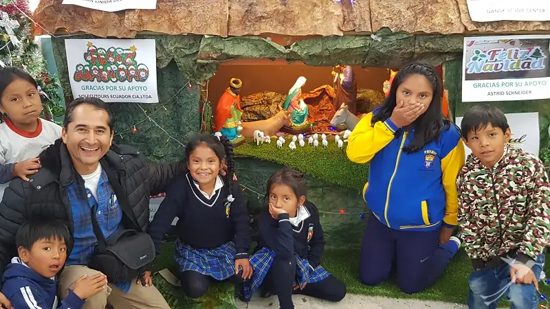kids in front of a cradle at the refugio de los sueños