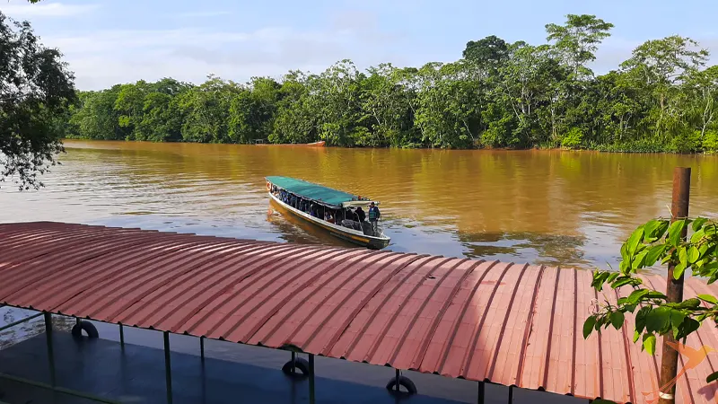 boat on the river at drop of pint Yasuni