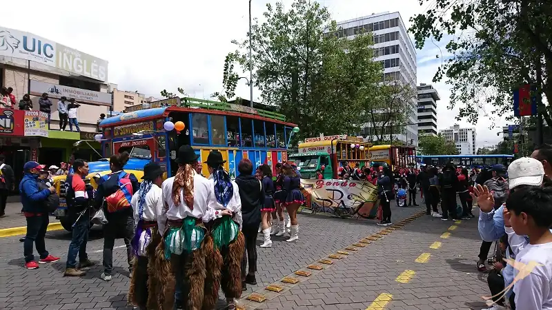 the carnival parade is preparing in the Mariscal in Quito