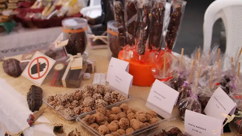 sweets on a stand in a street of Quito