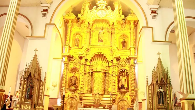 golden altar inside the church San Jose