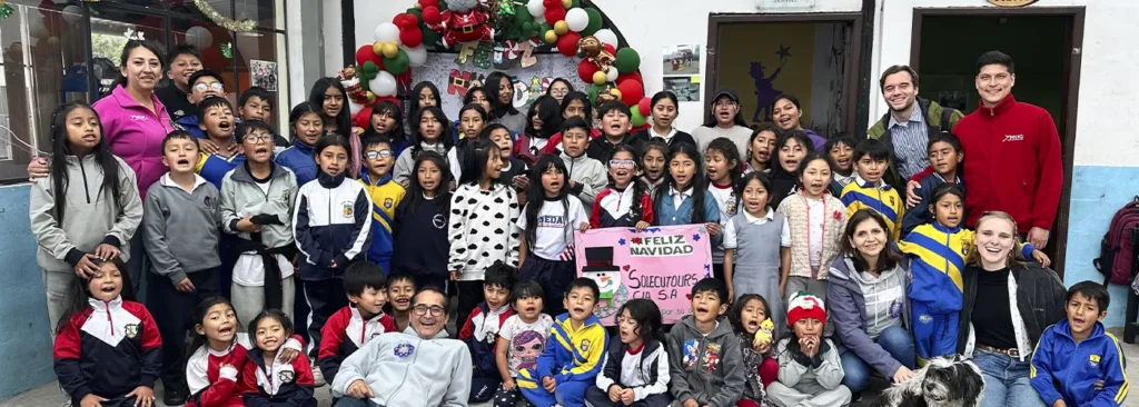 Children and educators from the Refugio de los Sueños social project gathered during a community activity in Quito, Ecuador.