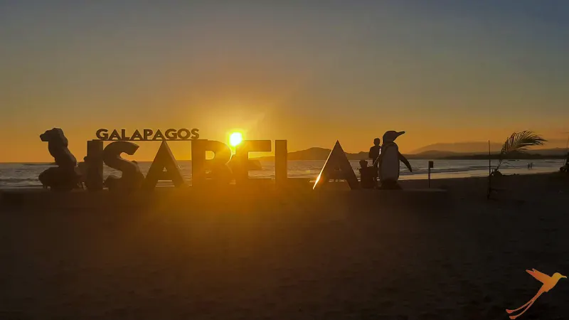 sunset on Isabela Island with letters