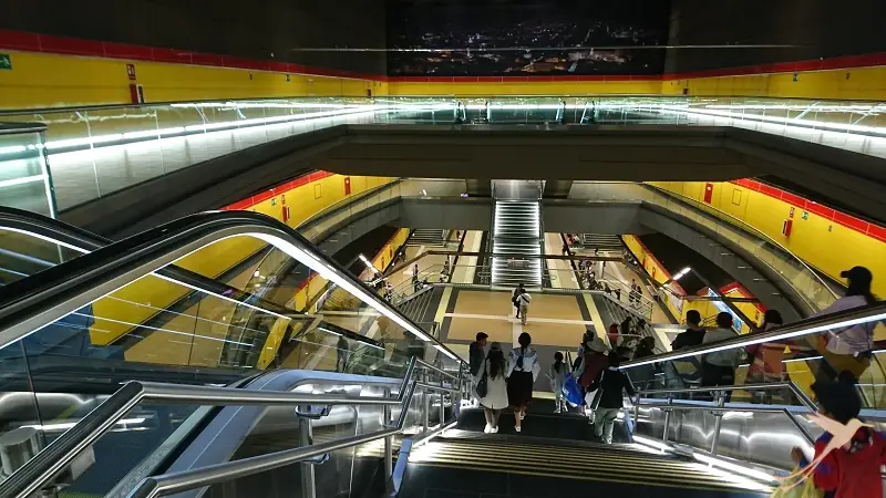 Metro station with moving stairways