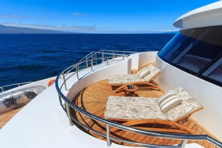sun chairs on the upper deck of yacht Elite