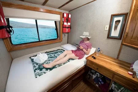 double cabin of yacht fragata with a tourist